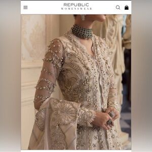 Elegant White and Gold Embellished designer dress